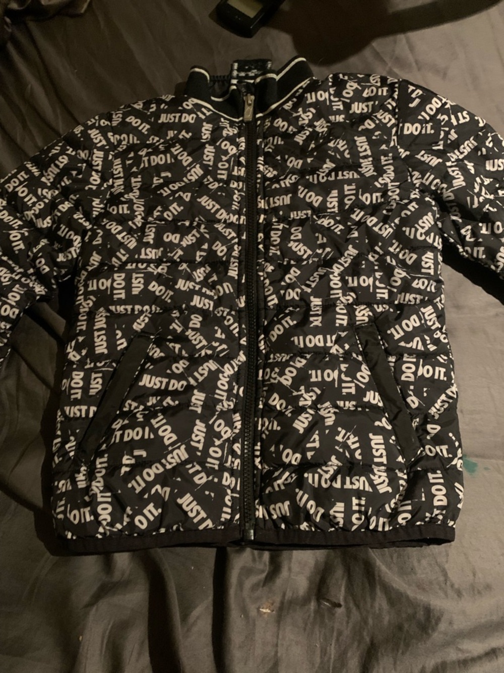 Nike Black Puffer Jacket with White "Just Do It" All-Over Print